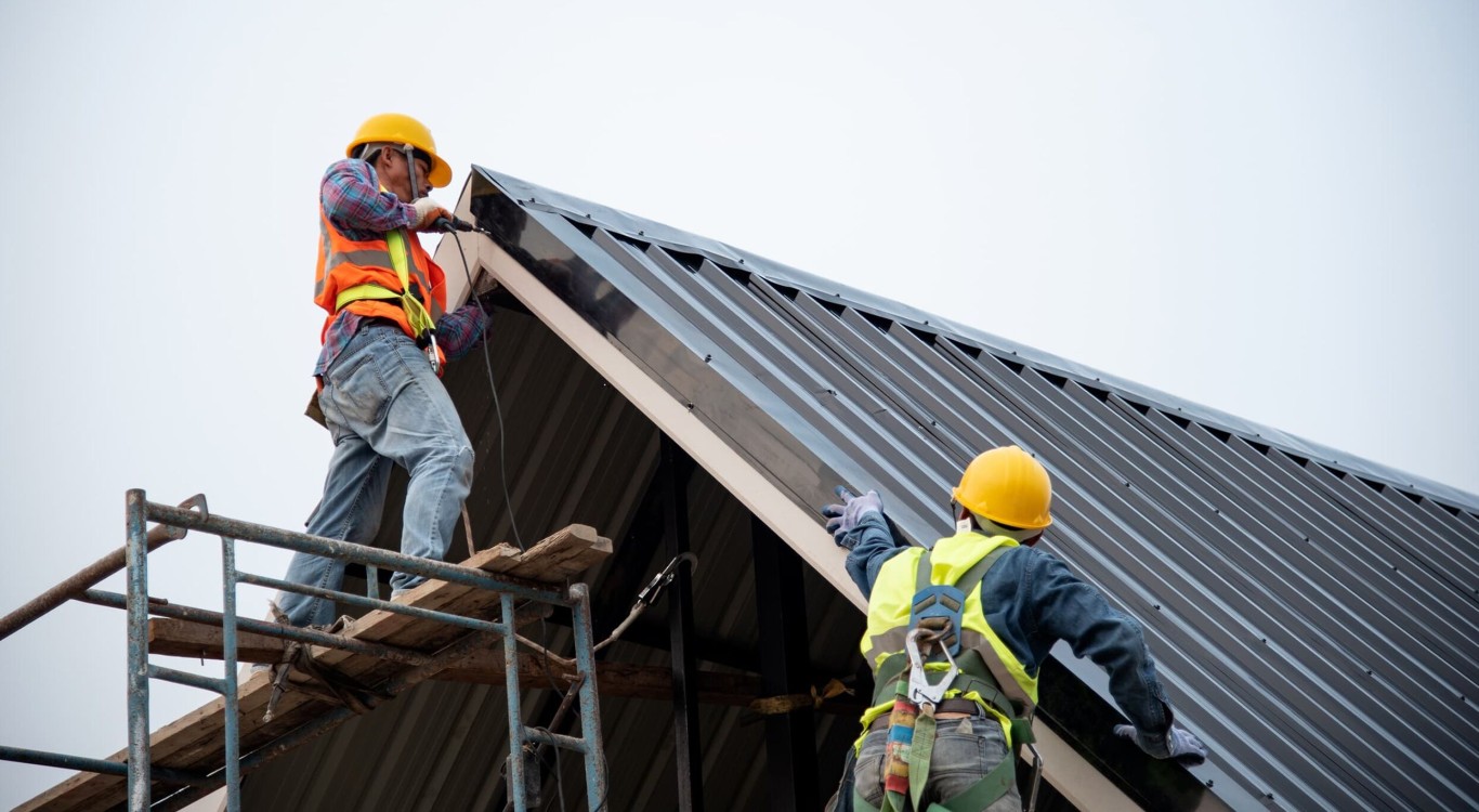 Professional roofing contractors performing thorough roof inspection in Berkeley, CA